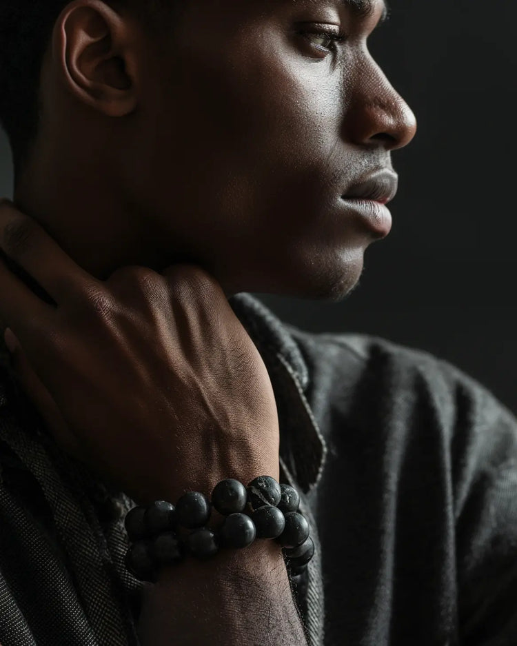 A YOUNG MAN WITH A NEW BRACELET