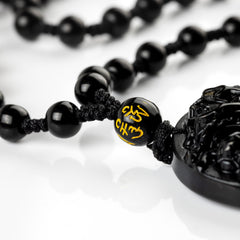 Obsidian-Anhänger mit Drachenmuster-Relief – Kraft, Eleganz, Erbe