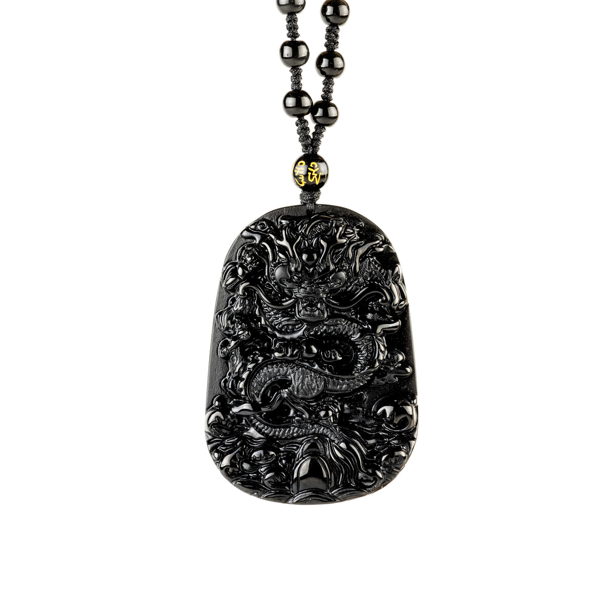Colgante en relieve con patrón de dragón de obsidiana: poder, elegancia, herencia